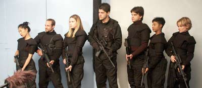 members of the Gaia team gather their weapons