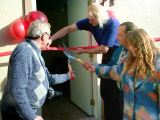 cutting the ribbon at the computer cottage