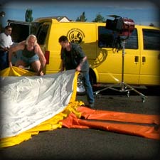 taking the highfall bag out of the stunt van